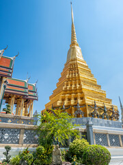 Obraz premium The Royal Pantheon, unique beautiful building in The Temple of Emerald Buddha, landmark of Bangkok, Thailand, under summer blue sky