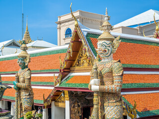 Fototapeta premium The great iconic giant, from Ramayana literature, act as guard protect entrance of The Temple of Emerald Buddha in Bangkok, Thailand