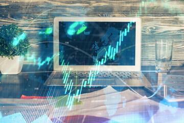 Multi exposure of forex graph and work space with computer. Concept of international online trading.