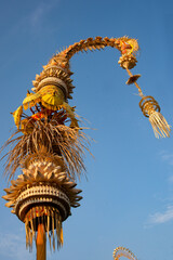 Balinese penjor with ablue sky background