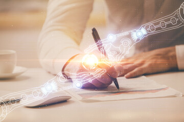 Fototapeta premium Man in white shirt with technology icons.