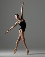 Young beautiful ballet dancer is posing in studio © Alexander Y