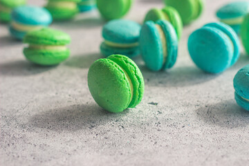 Macaroons. Delicious french desserts. Macaroons on the table. Macaroons with cream cheese and apples