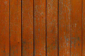 wooden background of red boards. texture of shabby paint 
