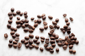 coffee beans on a marble table with copy space for your text