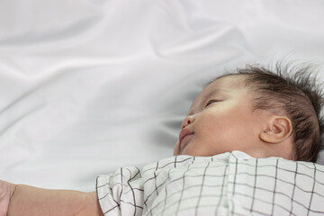 Portraiture image of Three month old Asian Cute little baby boy lsolated on white background