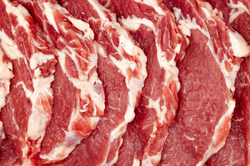 Fresh raw  beef steak. Juicy meat background.