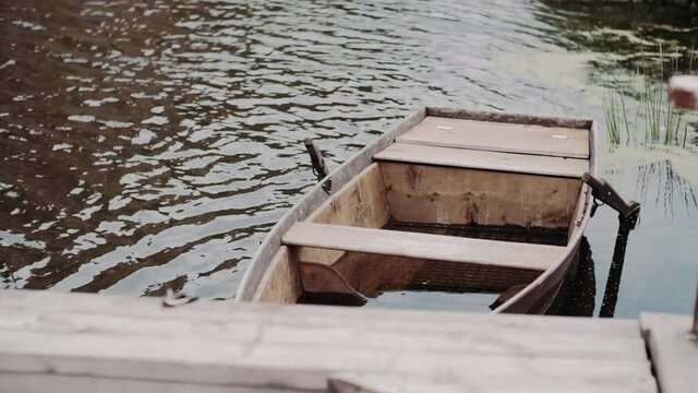 sunken boat near the river bank