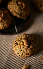Oatmeal sesame cookies. Healthy homemade dessert decorated with sesame seeds. set on rustic wooden background.