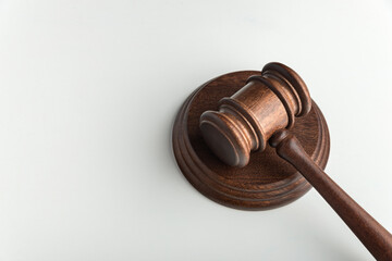 Wooden judge gavel and sound Board on white background. Top view. Auction. Copy space