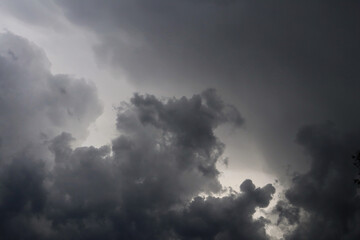 Fototapeta na wymiar the dark clouds make the sky in black. The rain is coming soon