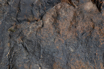 Layers of rock weathered and eroded by water and wind