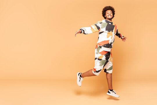 Young Afro Man Having Fun Jumping