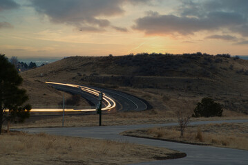 driving on highway at sunrise