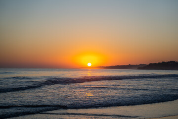 Falesia beach on the seashore at sunset. Olhos de Agua, Algarve, Portugal