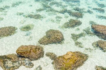 Rocks in beautiful turquoise crystal clear sea water