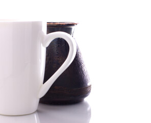 cezve with a mug on a white background