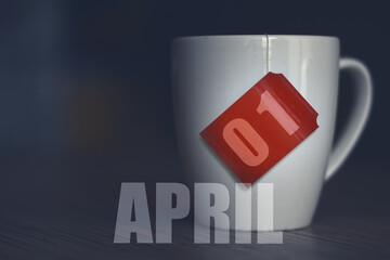 april 1st. Day 1 of month, Tea Cup with date on label from tea bag. spring month, day of the year concept
