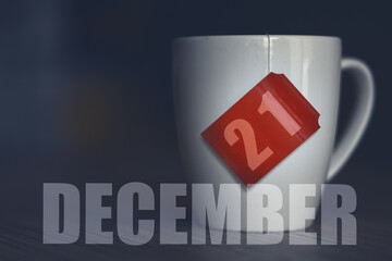 december 21st. Day 20 of month,Tea Cup with date on label from tea bag. winter month, day of the year concept