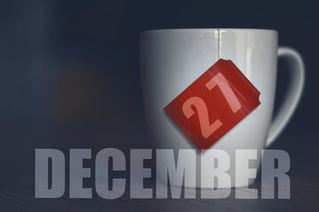 december 27th. Day 27 of month,Tea Cup with date on label from tea bag. winter month, day of the year concept