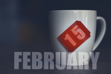 february 15th. Day 15 of month,Tea Cup with date on label from tea bag. winter month, day of the year concept