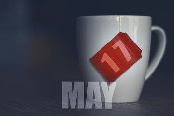 may 17th. Day 17 of month,Tea Cup with date on label from tea bag. spring month, day of the year concept