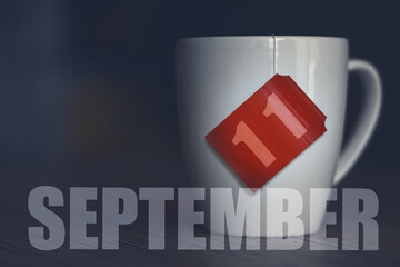 september 11th. Day 11 of month,Tea Cup with date on label from tea bag. autumn month, day of the year concept