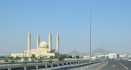 Oman to nizwa city highway road travel. Mosque sunset view Largest mosque in Muscat, famous  beautiful architecture design in oman