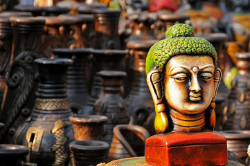 An idol of budha of clay at the shop,Clay model of  lord ,Indian Gods and Goddesses.