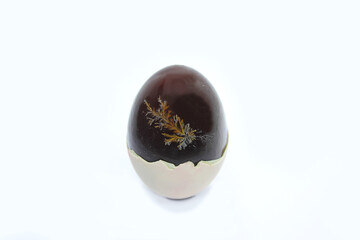preserved eggs on white background