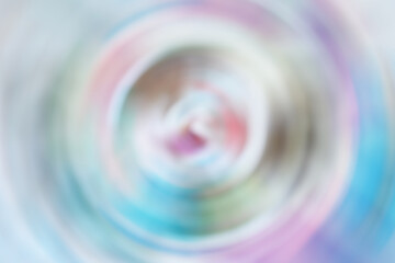 Blurred gradient radial motion multicolor background. Mixed colorful circular texture