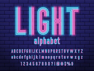 Glowing neon light alphabet design © FotoGraphic