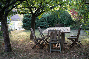 closeup of Teak garden furniture in the private garden
