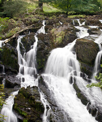 multiple waterfalls trees Wales UK