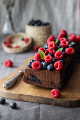 Cake with blueberries and raspberries 