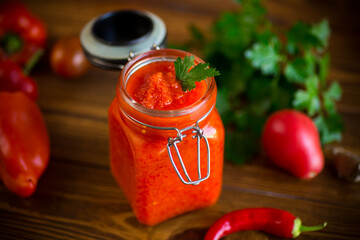fresh natural homemade sauce made of peppers, tomatoes and other vegetables