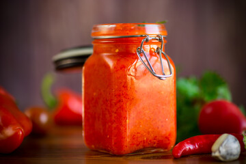 fresh natural homemade sauce made of peppers, tomatoes and other vegetables