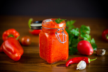fresh natural homemade sauce made of peppers, tomatoes and other vegetables