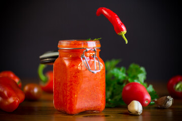fresh natural homemade sauce made of peppers, tomatoes and other vegetables