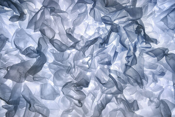 Abstract background with elegant tissue paper clouds placed on a white light background that...