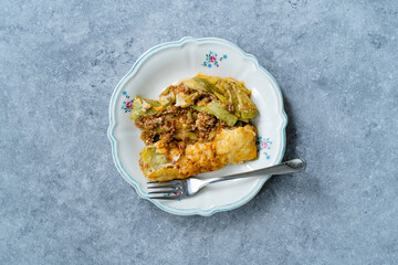 Healthy Zucchini Lasagna Bolognese Cooked with Courgette in Plate Portion.