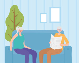 activity seniors, old man reading newspaper and elderly woman sitting on sofa in the home