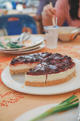 pieces of blueberry cheesecake on the tray 