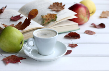 hot coffee and fruit with an open book. autumn weekend romantic