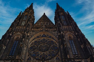 Fototapeta premium West View and Main Portal of St Vitus Cathedral in Prague Castle Complex. Beautiful Exterior of Metropolitan Cathedral in Czech Republic. 