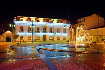 night landscape of the fountain in the central square of Portimao, Praca da Republica, Algarve,...