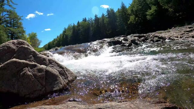 Rushing waterfall in NB Canada at Gordon Falls. This Clip is before the waterfalls starts and in the middle of the woods. Perfect paradise
