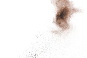 Brown powder explosion isolated on white background.