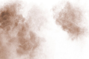 Brown powder explosion isolated on white background.