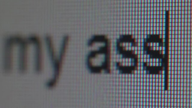 Typing rude phrase. Macro view.